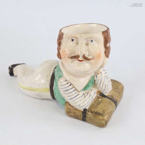 A 19th century Staffordshire Pottery pot in the form of Capt...