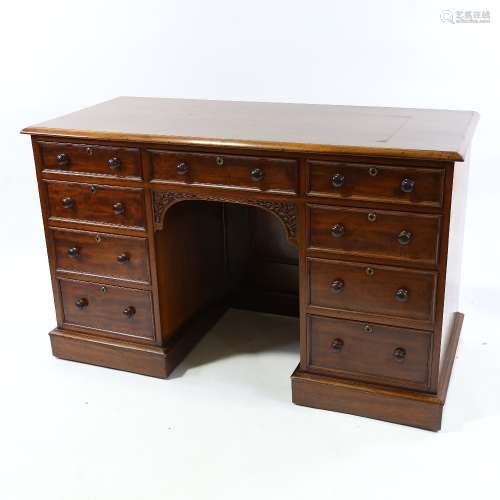 A Victorian mahogany pedestal desk, with 9 drawers, relief c...