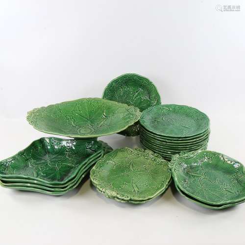 A quantity of 19th century green pottery serving plates and ...