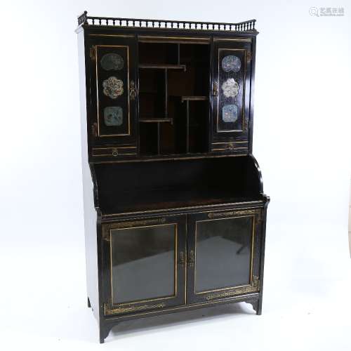 A Victorian Aesthetic Movement cabinet, attributed to Collin...
