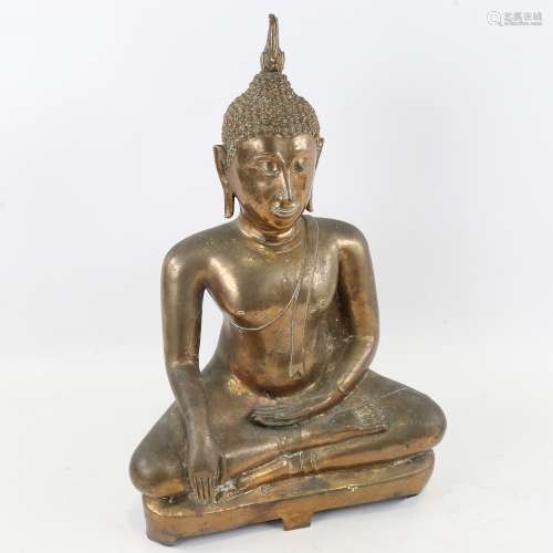 A Chinese gilt-bronze seated Buddha, height 40cm Gilding is ...
