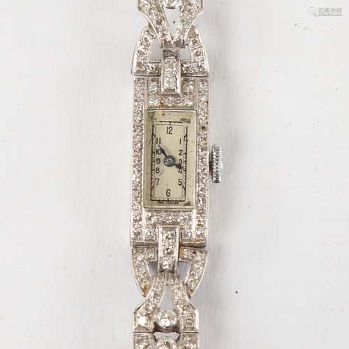 A lady's Art Deco platinum and diamond mechanical cocktail w...