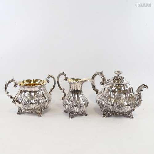 An ornate 19th century electroplate 3-piece melon-shaped tea...