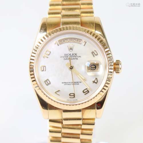 ROLEX - an 18ct gold Oyster Perpetual Day-Date automatic wri...