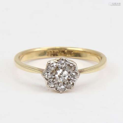 An 18ct gold diamond cluster flowerhead ring, set with old E...