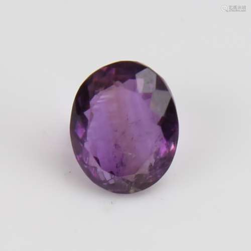 A 5.46ct unmounted oval mixed-cut amethyst, dimensions: 12.4...