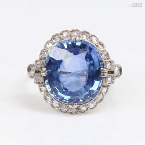 A large French 18ct white gold sapphire and diamond cluster ...