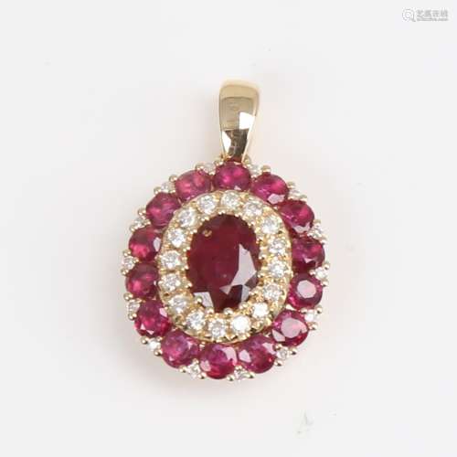 A modern 14ct gold ruby and diamond cluster pendant, set wit...
