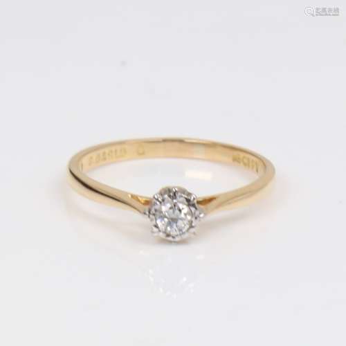 An 18ct gold 0.1ct solitaire diamond ring, modern round bril...