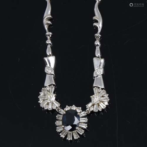 A modern 18ct white gold sapphire and diamond cluster neckla...