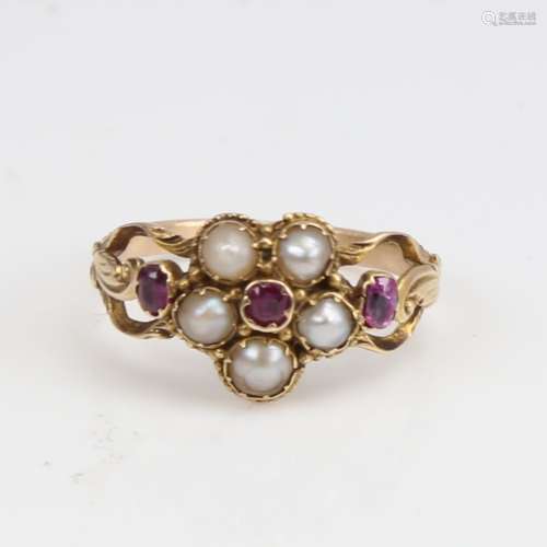 A Victorian unmarked gold split-pearl and ruby cluster memor...