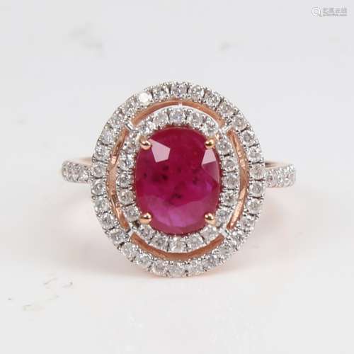 A modern 14ct rose gold ruby and diamond cluster double-halo...