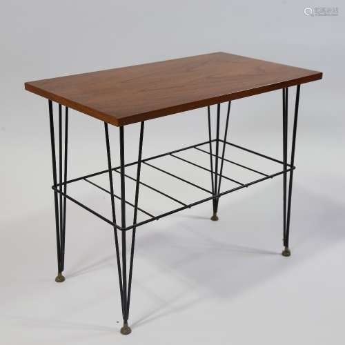 A SWEDISH, mid-century wire framed coffee table with magazin...