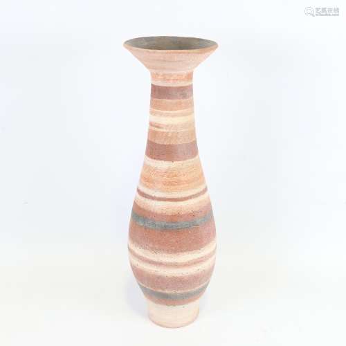 A large eartenware studio pottery vase with banded and scraf...