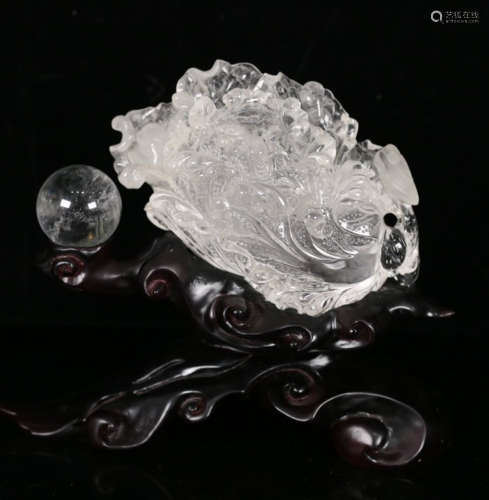 CRYSTAL CARVED AUSPICIOUS ORNAMENT WITH WOOD BASE