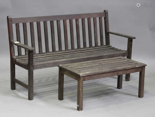 A modern slatted wooden garden bench, height 89cm, width 155...