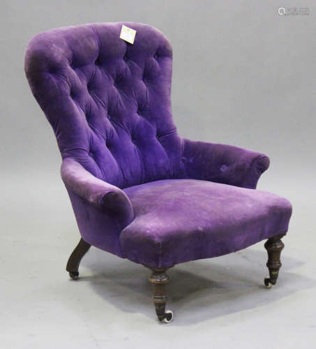 A mid-Victorian buttoned back nursing chair, upholstered in ...