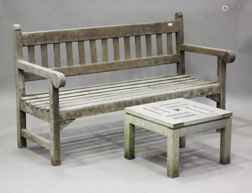 A late 20th century slatted wooden garden bench, height 90cm...