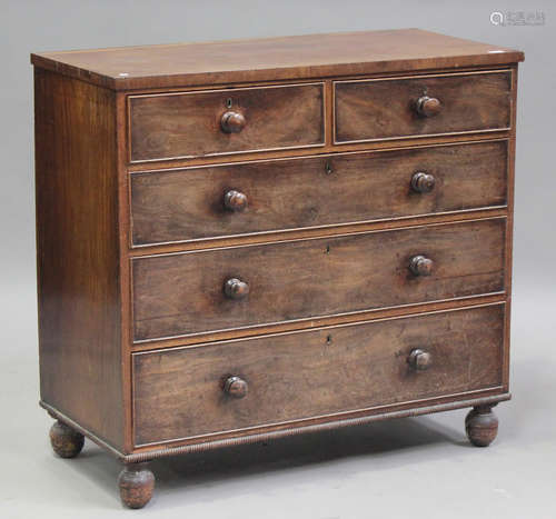 An early Victorian mahogany chest of drawers, on turned feet...