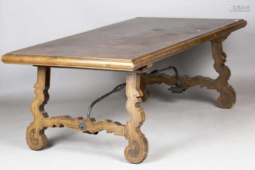 A 20th century Spanish oak refectory style dining table, the...