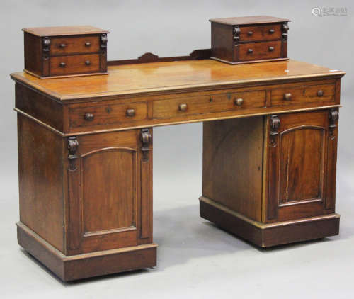 A Victorian mahogany twin-pedestal dressing table, fitted wi...
