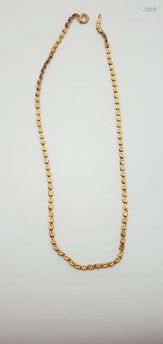 18K黄金项链(千分之750)，由精巧的叶子凿成的链节组成。重量：18.6克...