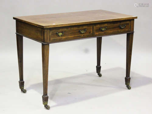 An Edwardian mahogany side table with boxwood stringing, fit...