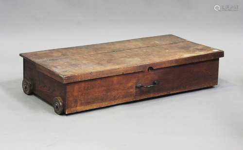 An early 20th century oak under-bed blanket box with hinged ...