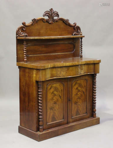 A Victorian mahogany chiffonier with carved scroll decoratio...