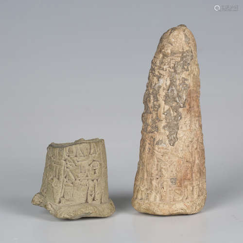 A Sumerian terracotta cuneiform foundation cone, reign of Li...