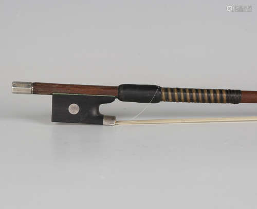 A silver mounted violin bow, length 74.5cm, weight 57.3g.Buy...