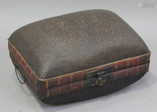 A Chinese provincial rattan box, intricately woven with geom...