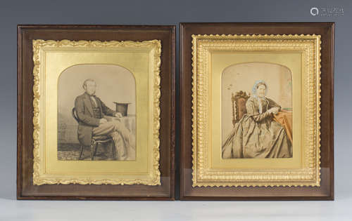 A near pair of hand-coloured Victorian photographs, mounted ...