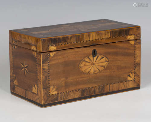 A George III mahogany tea caddy, the hinged lid inlaid with ...