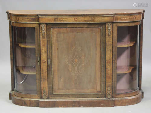 A late Victorian walnut credenza with foliate inlaid decorat...