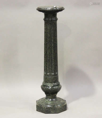A late 19th century green serpentine display pedestal, the r...