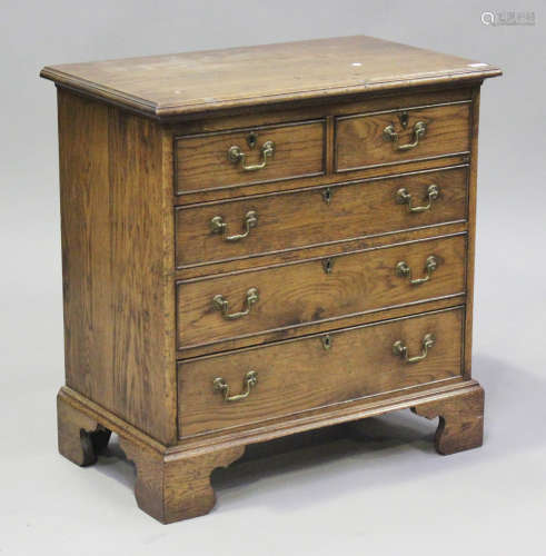 A late 20th century George III style oak chest of drawers, h...