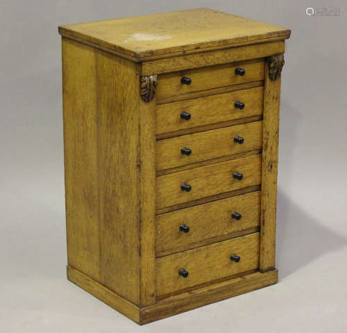 A Victorian oak table-top Wellington collector's chest of si...