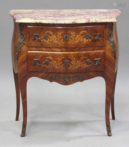 A late 20th century French kingwood and foliate inlaid bombé...