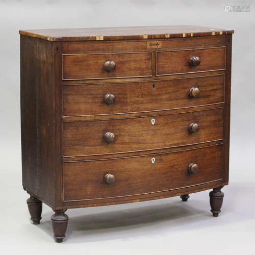 A 19th century mahogany bowfront chest of two short and thre...