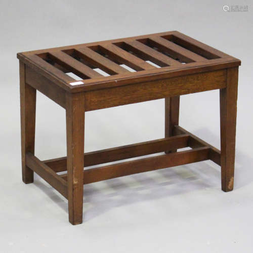 An early 20th century mahogany luggage rack with slatted top...