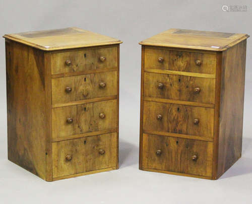 A pair of Victorian walnut chests of four graduated short dr...