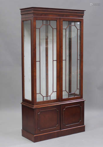 A late 20th century reproduction mahogany display cabinet, h...