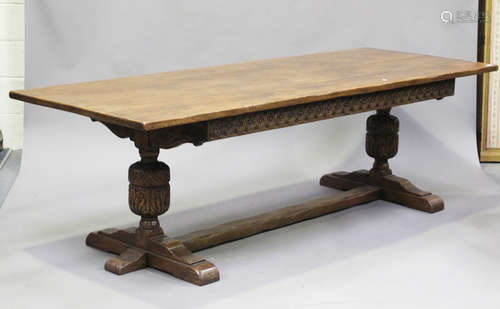 A 20th century Jacobean Revival oak refectory table, raised ...