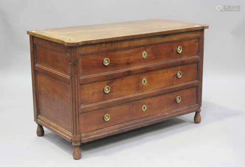 A 19th century French cherry commode, the hinged lid above a...