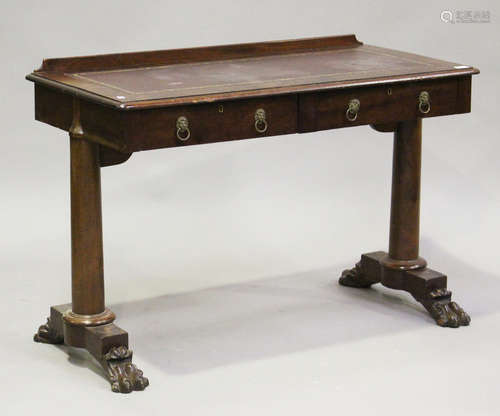 A Victorian mahogany writing table, fitted with two drawers,...