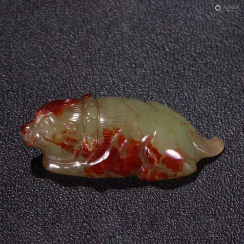 A russet jade carving of a pig