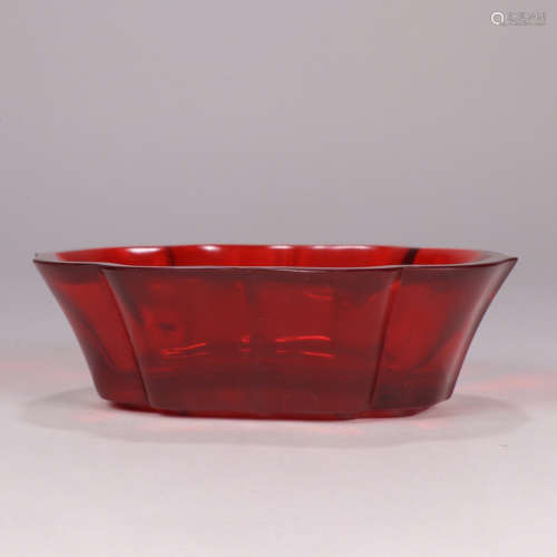 A red glass lobed washer