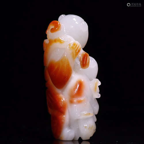 A carved hetian jade monkey ornament