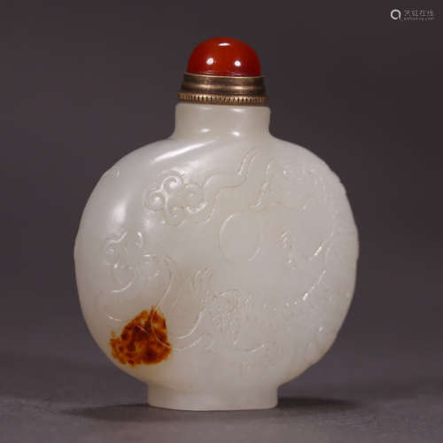 A carved heitian jade snuff bottle